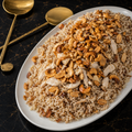Slow-Boiled Chicken serve with  Rice and nuts