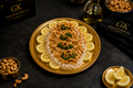 Grilled fish fillet cooked with  Tahini Sauce, Capsicum, Garlic, Lemon & Pine Nuts